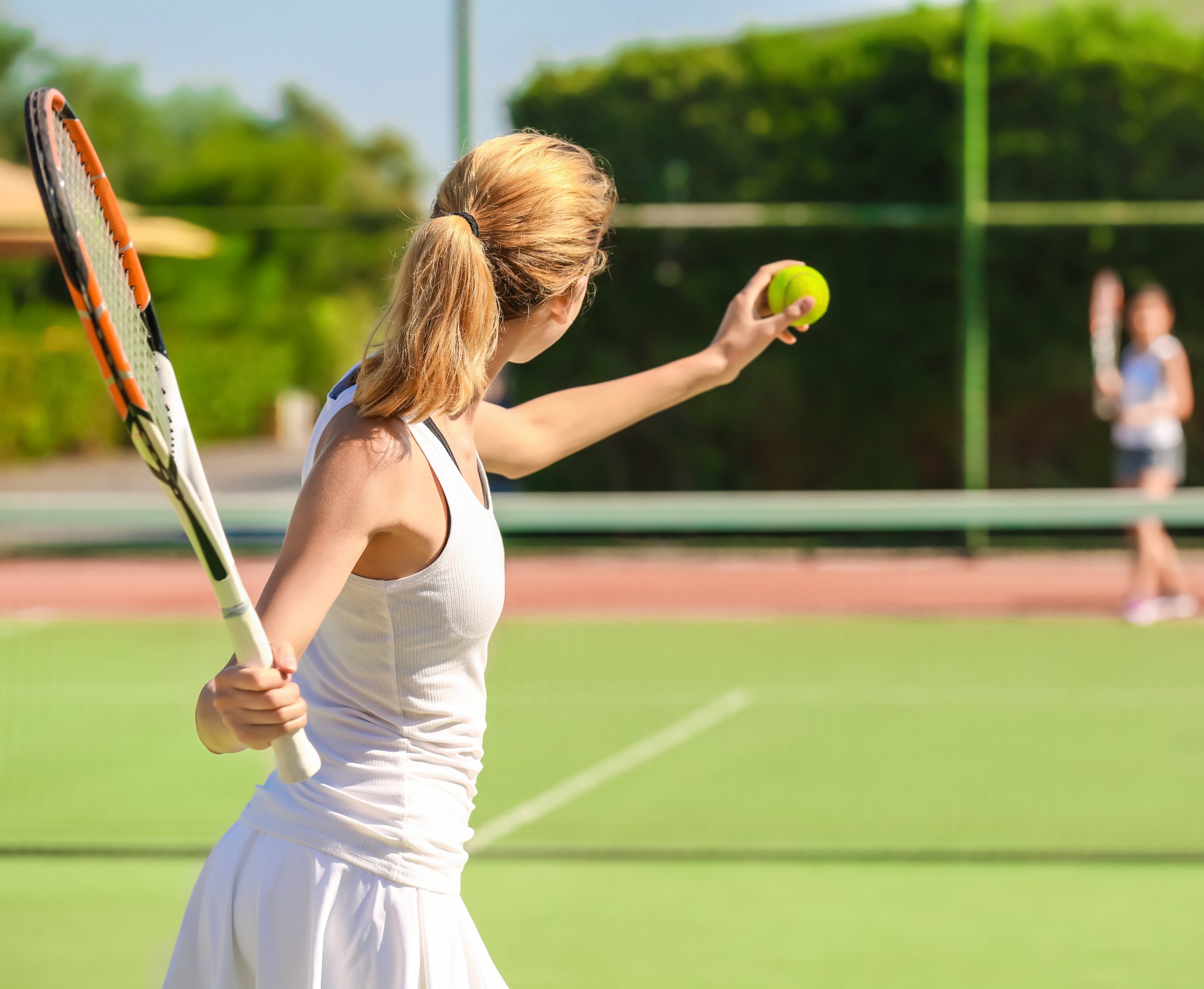 women playing tennis