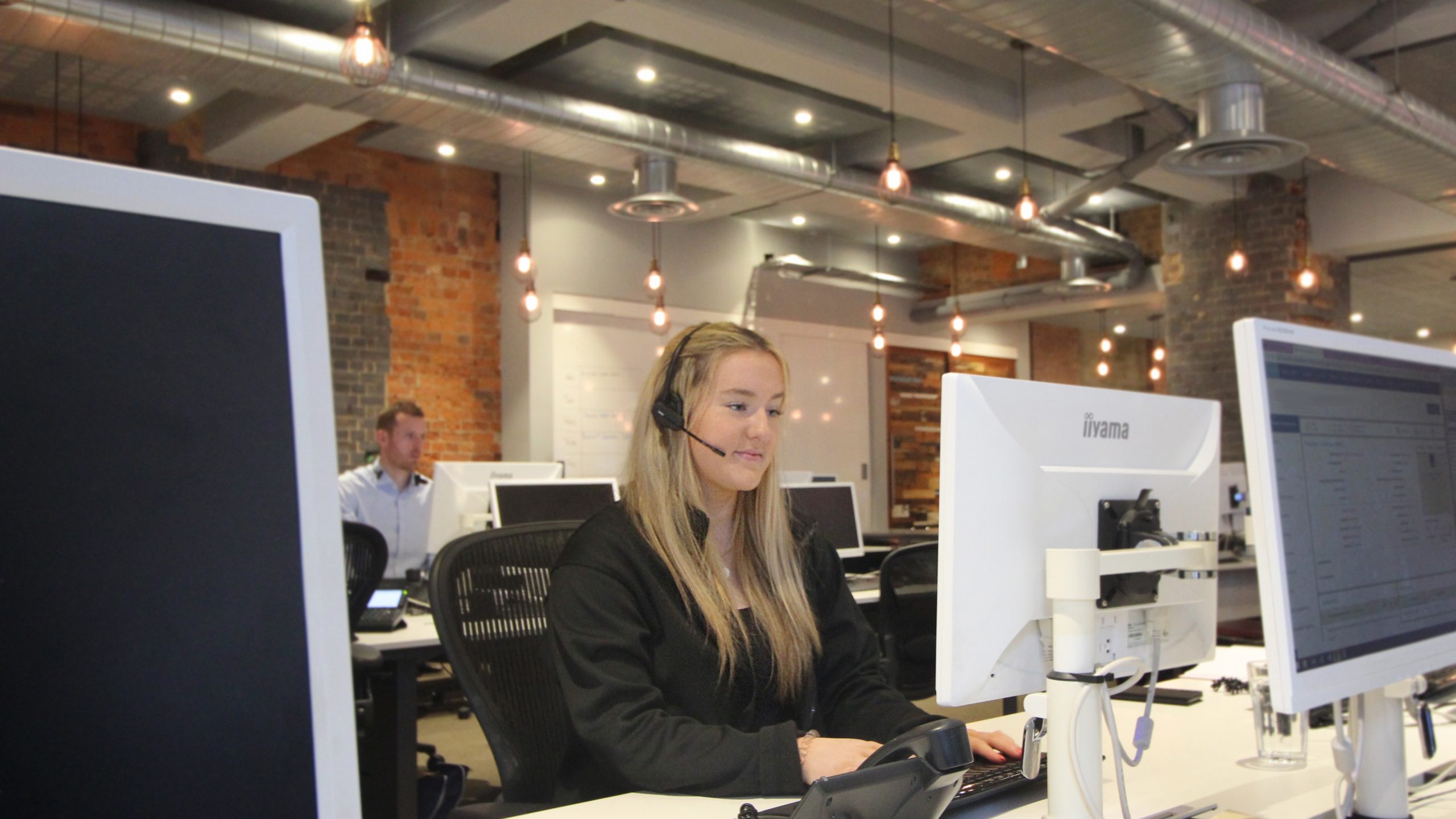 haslams estate agent at desk
